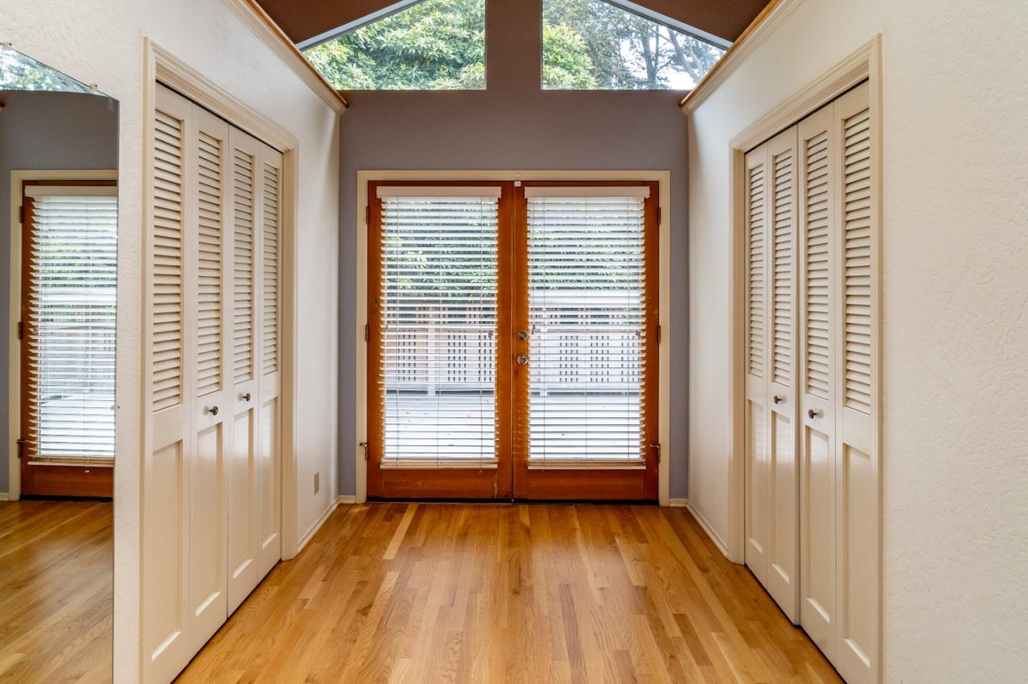 351 Lorimer Street Salinas, CA 93901 - Photo 21 of 37 a view of an empty room with wooden floor and a window