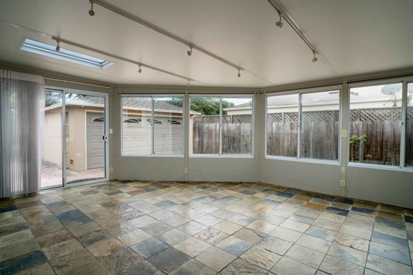 351 Lorimer Street Salinas, CA 93901 - Photo 23 of 37 a view of an empty room with a window