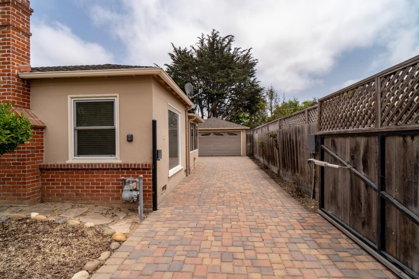 351 Lorimer Street Salinas, CA 93901 - Photo 37 of 37 a backyard of a house with wooden floor and fence
