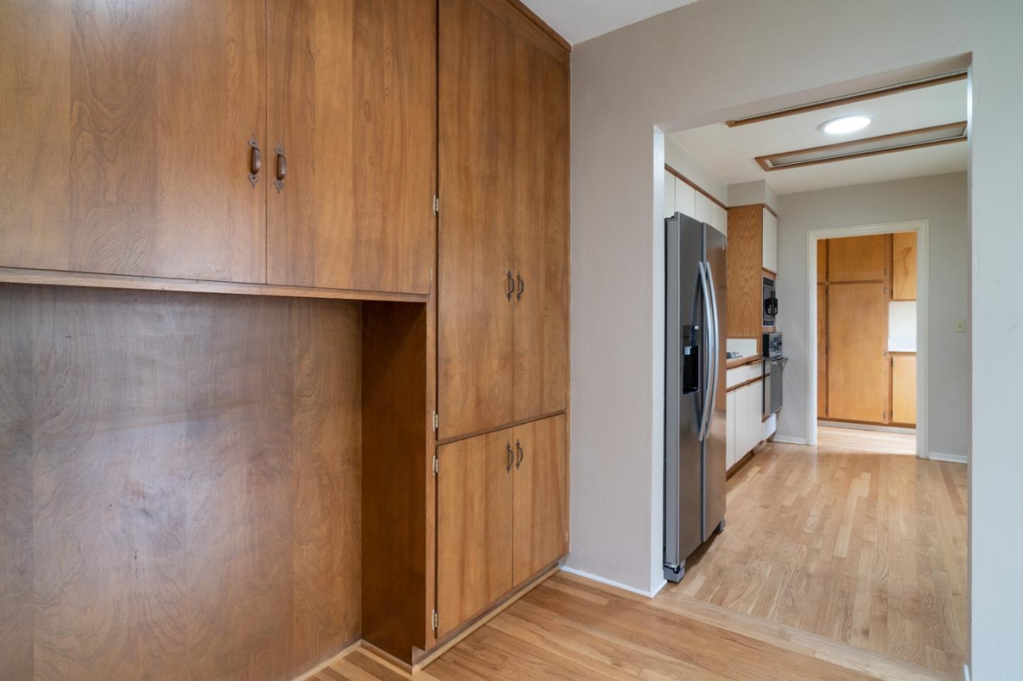 351 Lorimer Street Salinas, CA 93901 - Photo 7 of 37 a view of hallway with wooden floor and stairs