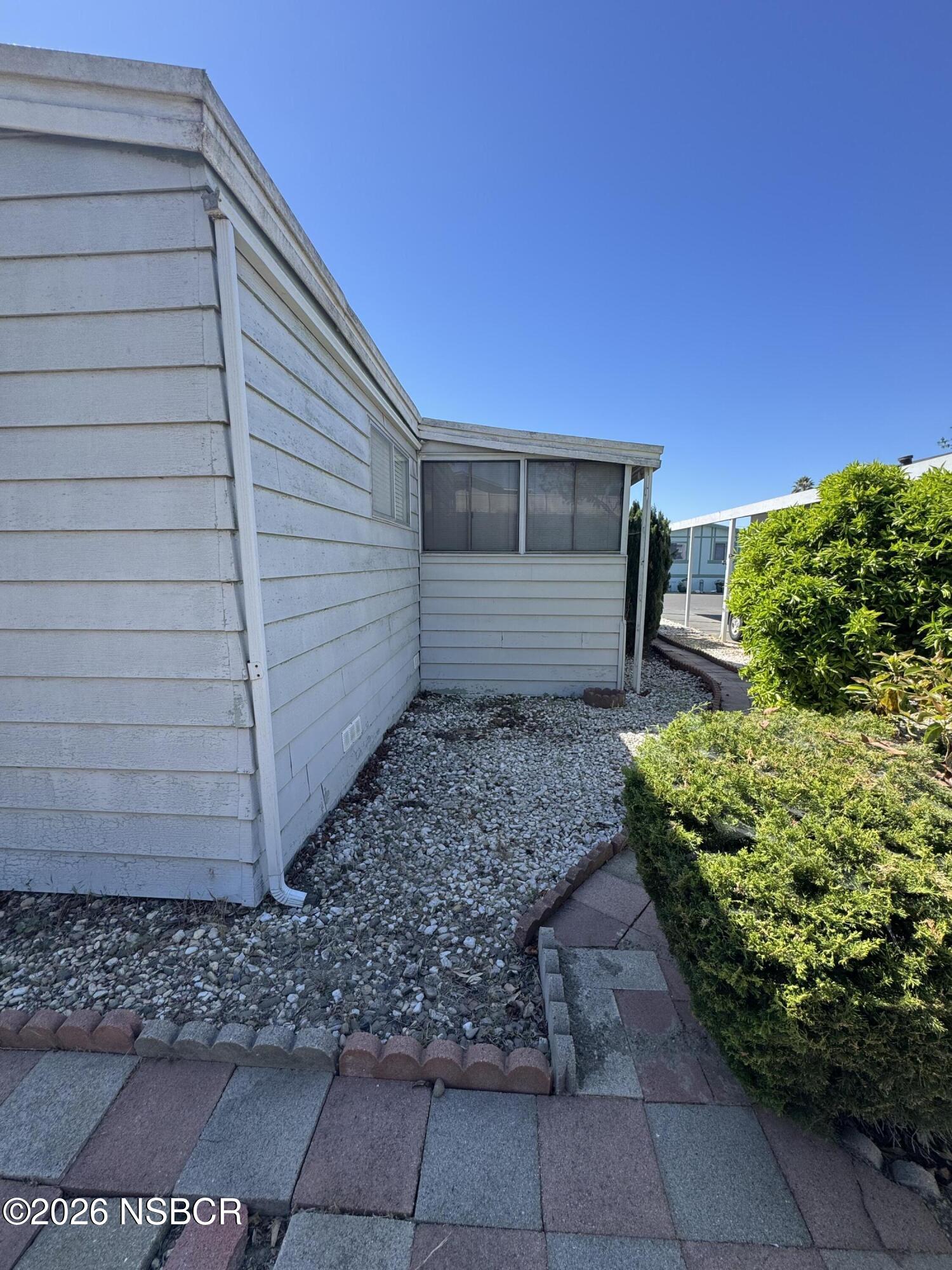 3210 Santa Maria Way, Unit 173 Santa Maria, CA 93455 - Photo 21 of 24 a view of a backyard