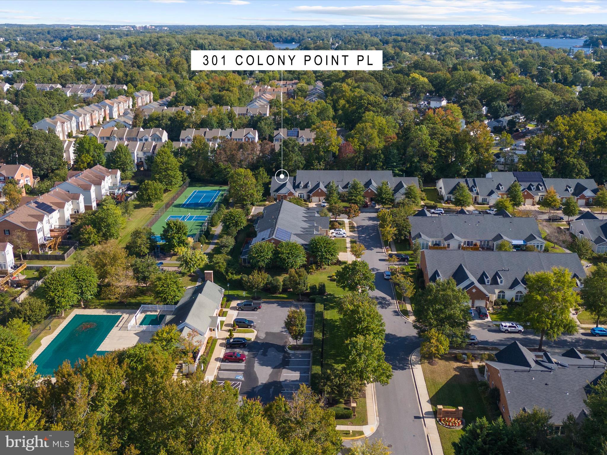 301 Colony Point Place Edgewater, MD 21037 - Photo 1 of 45 an aerial view of multiple house