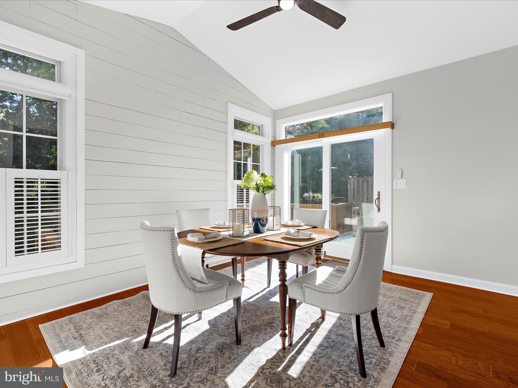 301 Colony Point Place Edgewater, MD 21037 - Photo 20 of 45 a view of a dining room with furniture wooden floor and a window