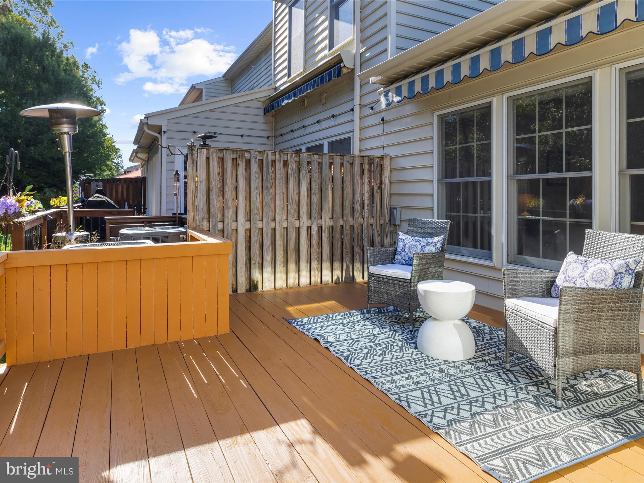 301 Colony Point Place Edgewater, MD 21037 - Photo 21 of 45 a view of a patio with table and chairs
