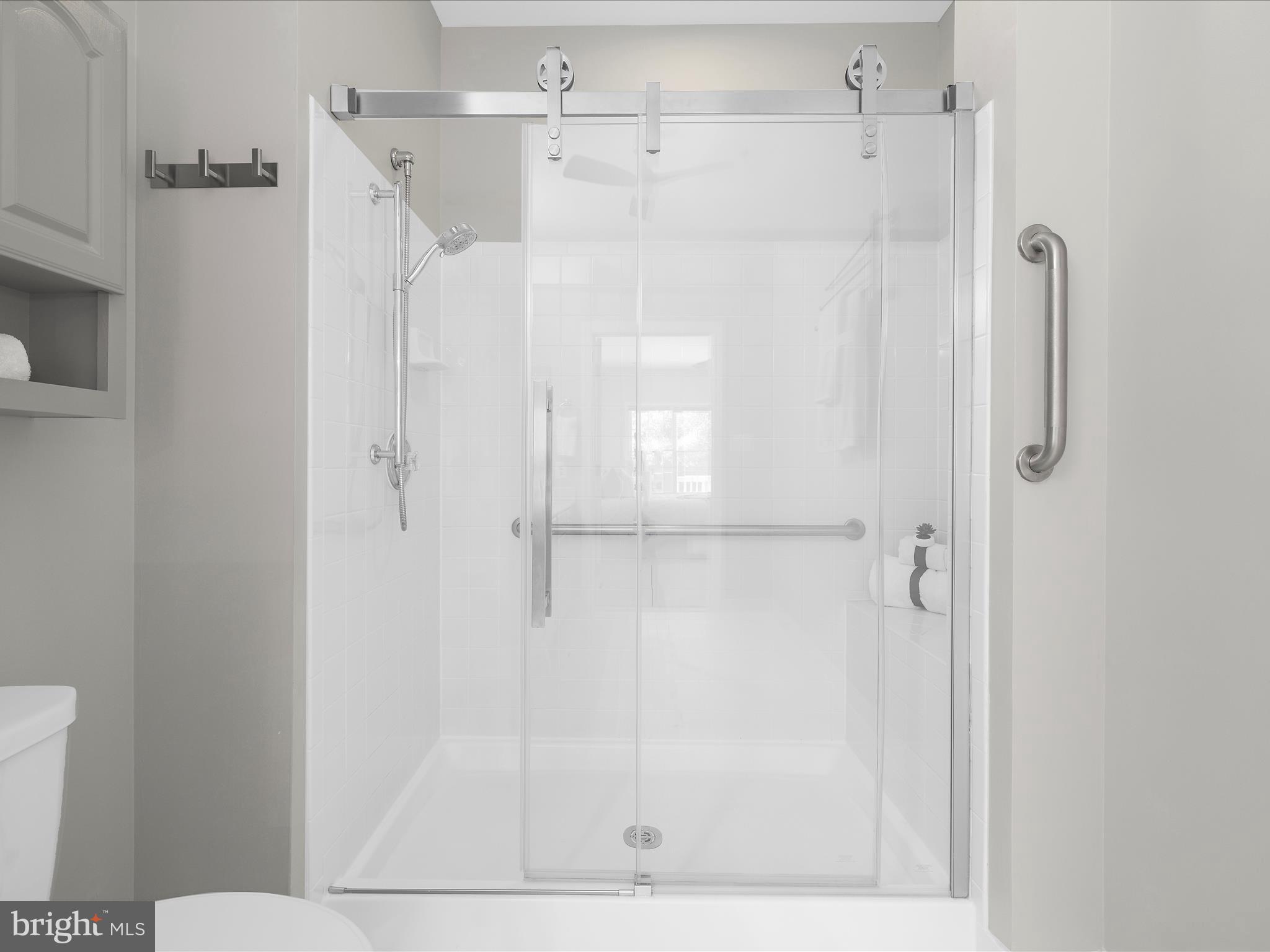 301 Colony Point Place Edgewater, MD 21037 - Photo 28 of 45 a bathroom with a shower