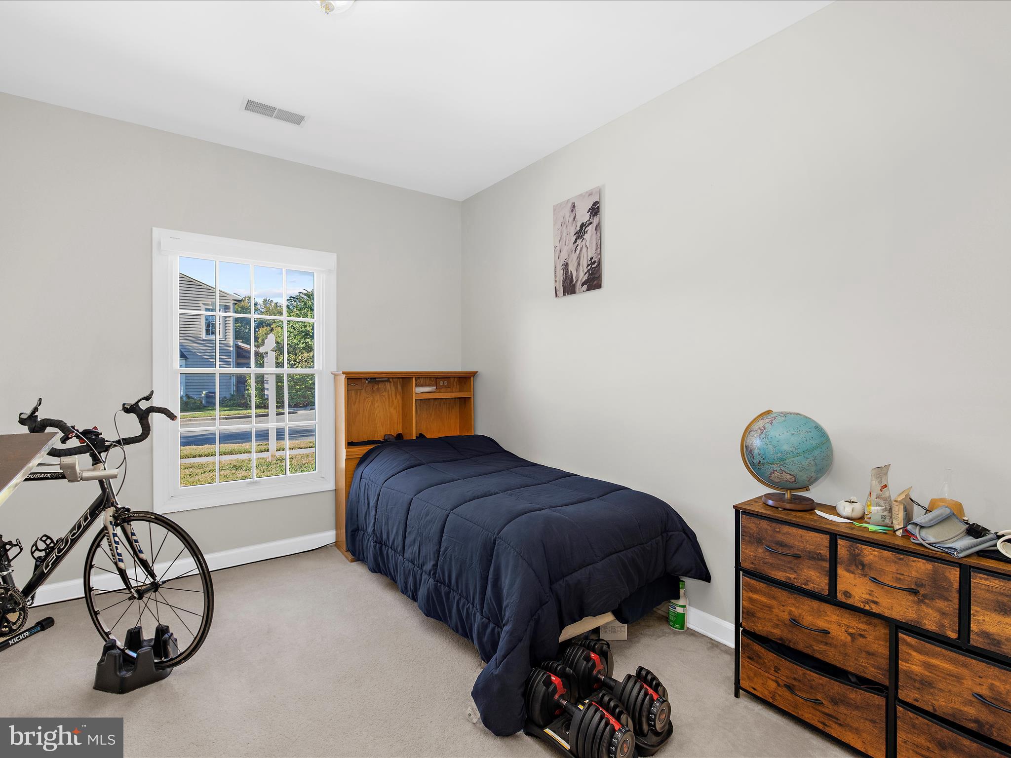 301 Colony Point Place Edgewater, MD 21037 - Photo 30 of 45 a bedroom with a bed and a window