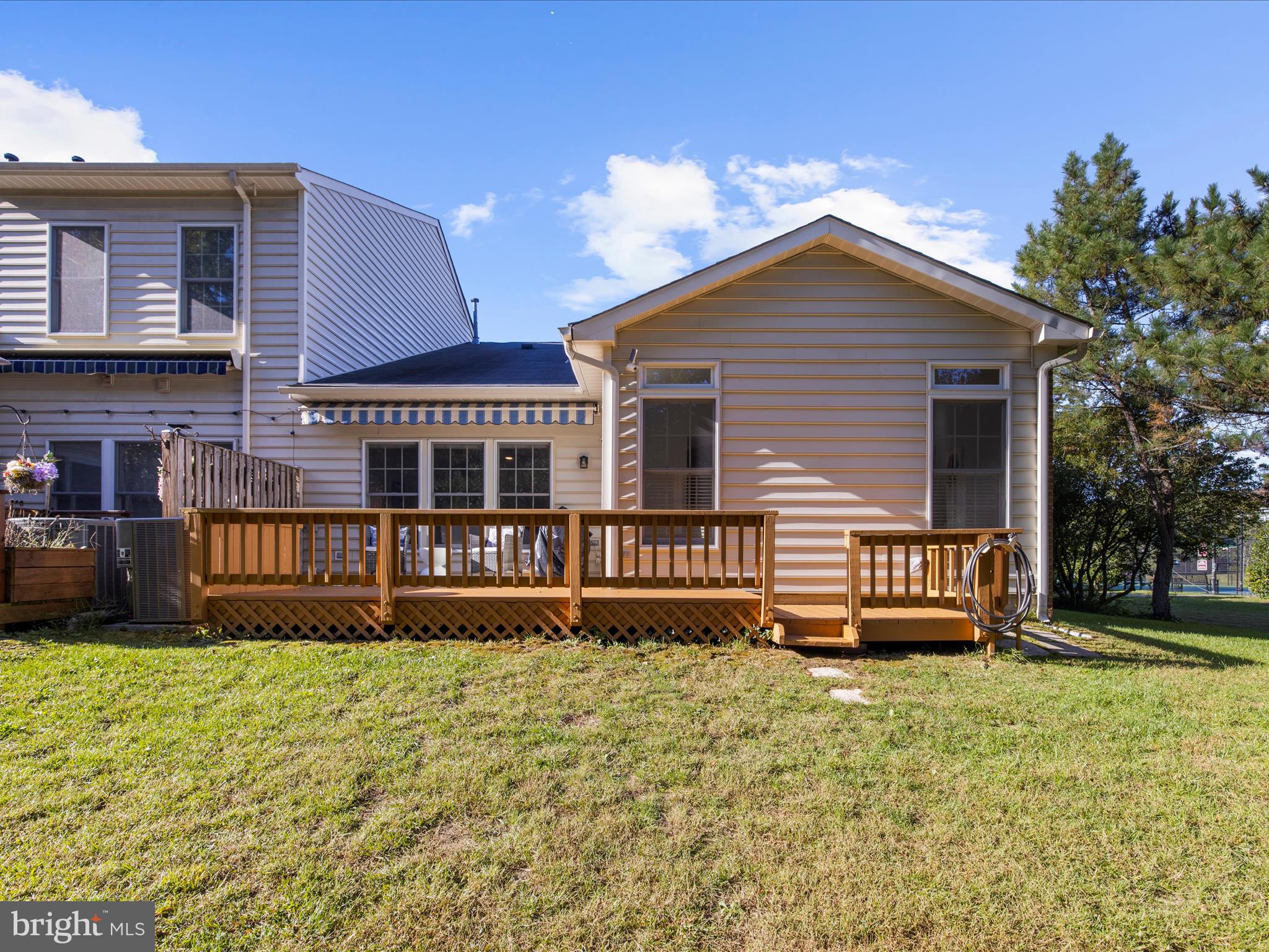 301 Colony Point Place Edgewater, MD 21037 - Photo 40 of 45 a front view of a house with garden