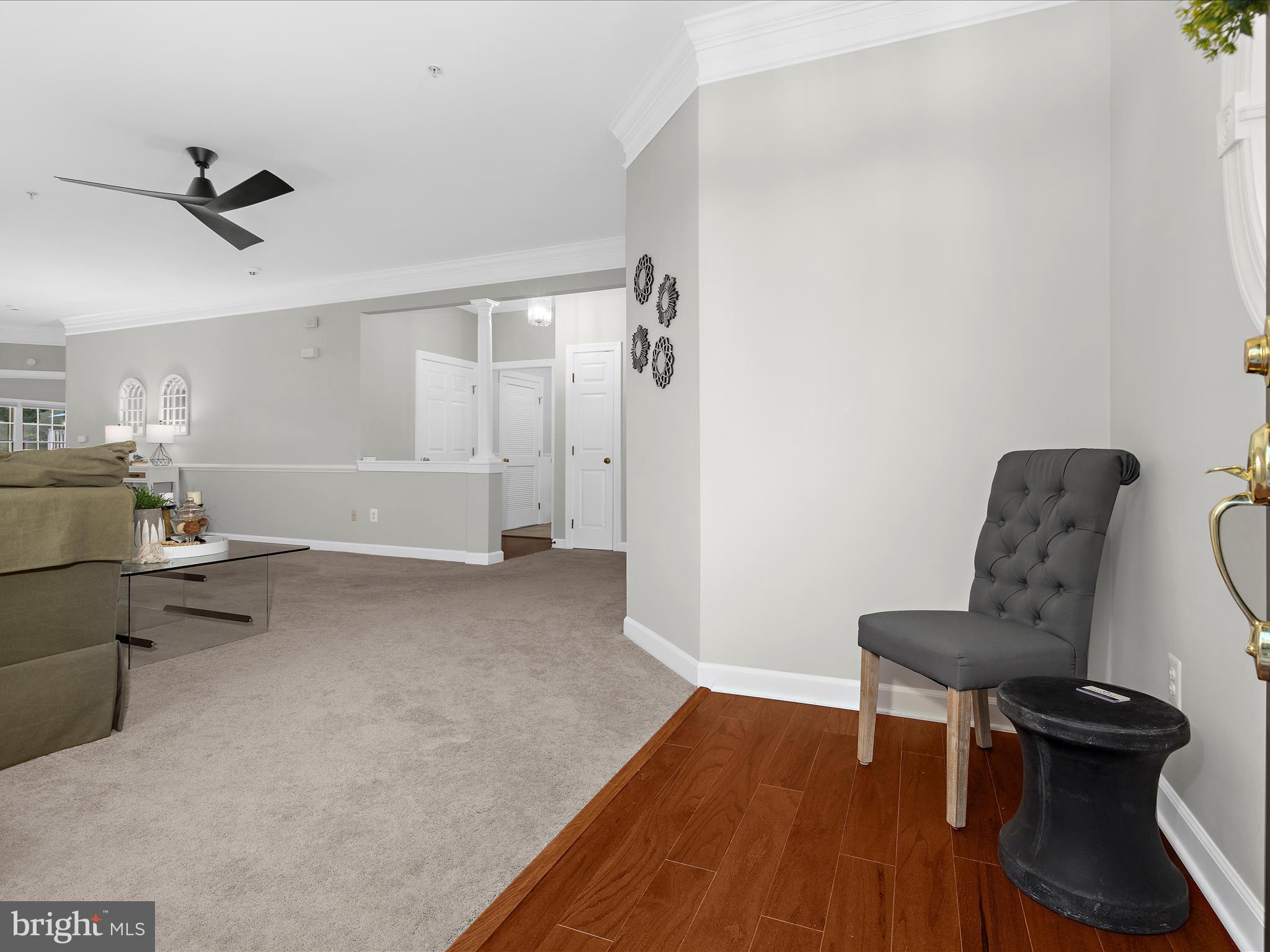 301 Colony Point Place Edgewater, MD 21037 - Photo 5 of 45 a view of a workspace with furniture and wooden floor
