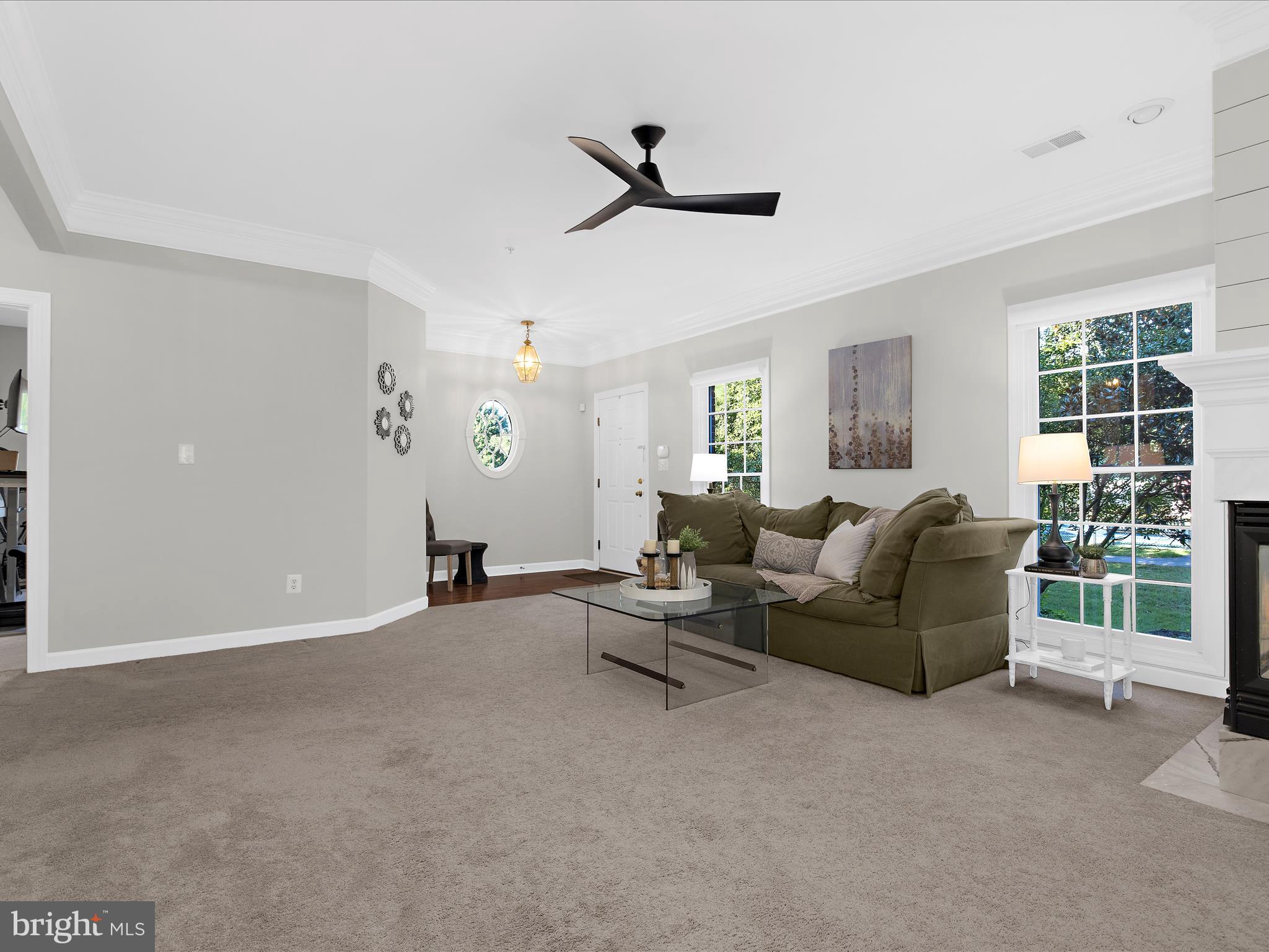 301 Colony Point Place Edgewater, MD 21037 - Photo 9 of 45 a living room with furniture