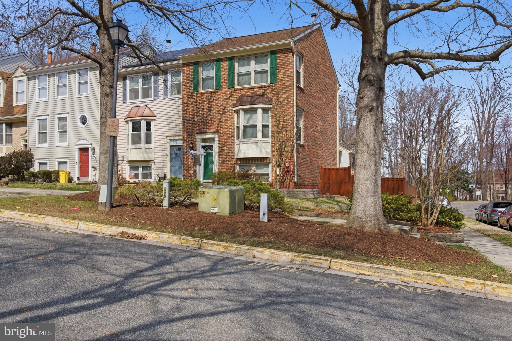 2036 Howard Chapel Turn Crofton, MD 21114 - Photo 2 of 55 a view of a street with a building in the background