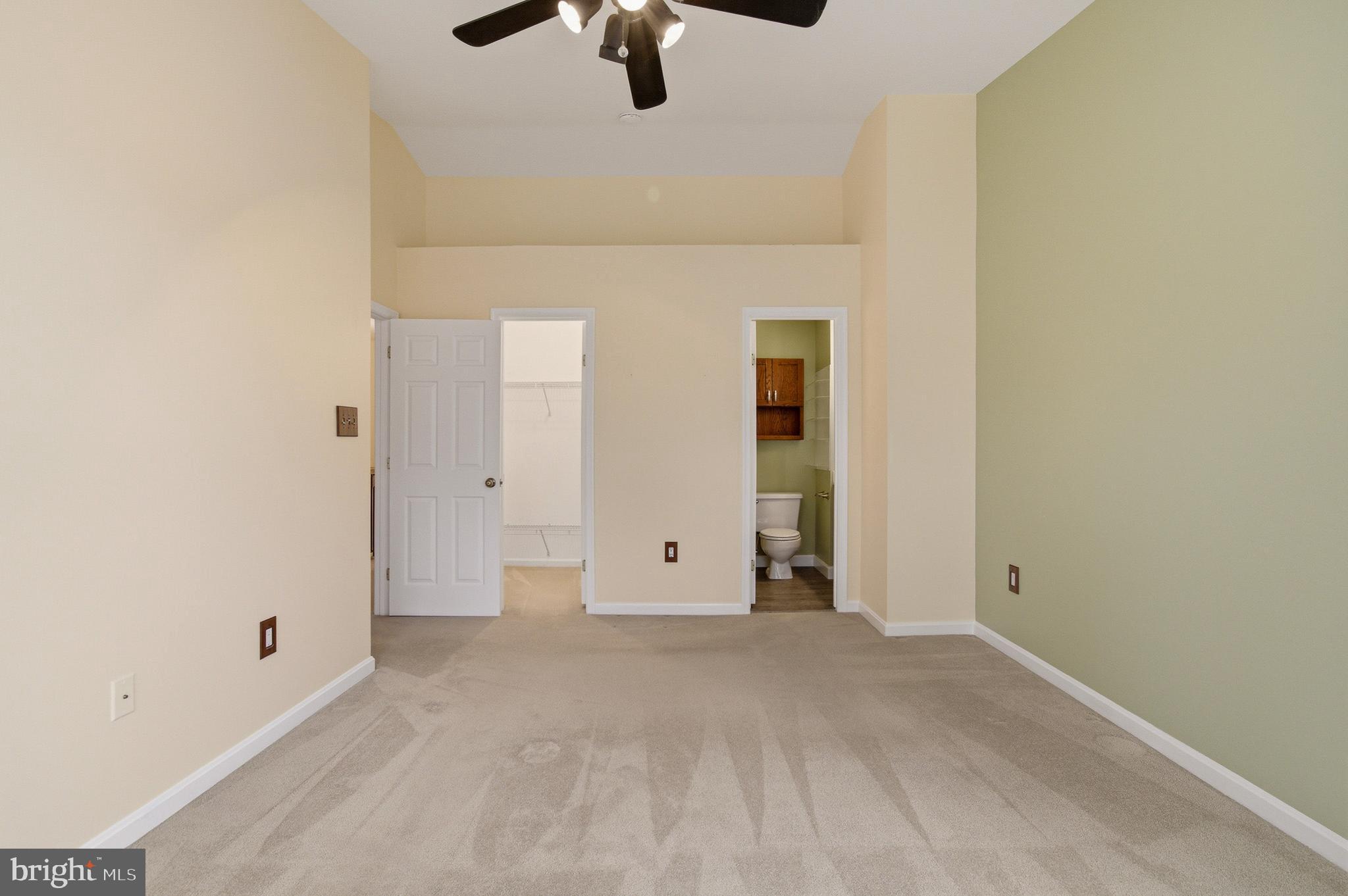 2036 Howard Chapel Turn Crofton, MD 21114 - Photo 27 of 55 a view of a livingroom with a ceiling fan