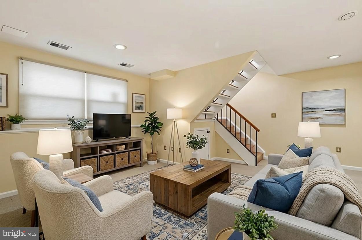 2036 Howard Chapel Turn Crofton, MD 21114 - Photo 43 of 55 a living room with furniture and a flat screen tv