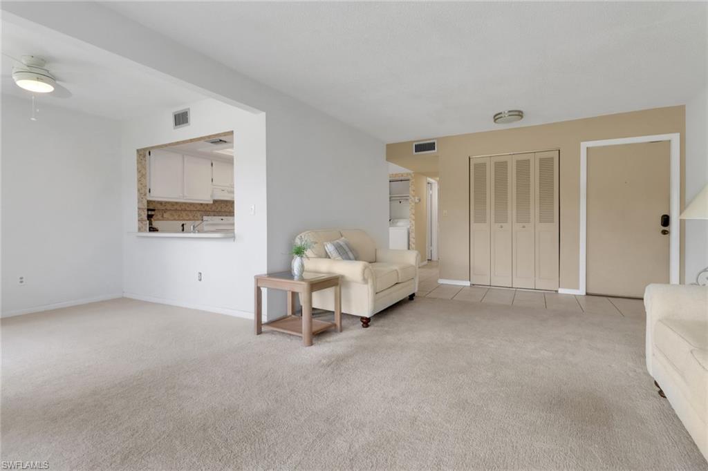 7077 Quail Run Court East, Unit A 15 Fort Myers, FL 33908 - Photo 13 of 43 a living room with furniture and a window