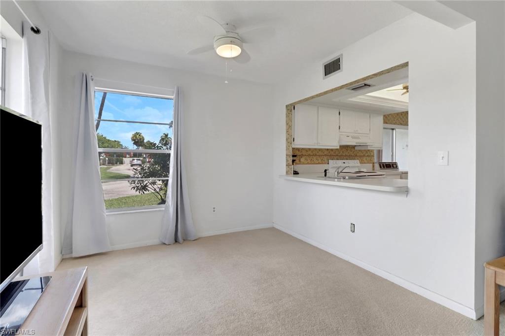 7077 Quail Run Court East, Unit A 15 Fort Myers, FL 33908 - Photo 18 of 43 a view of an empty room and window