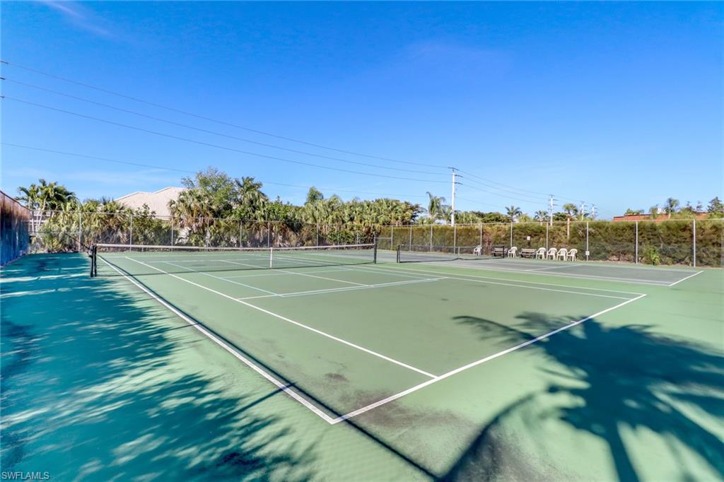 7077 Quail Run Court East, Unit A 15 Fort Myers, FL 33908 - Photo 40 of 43 a view of a tennis court