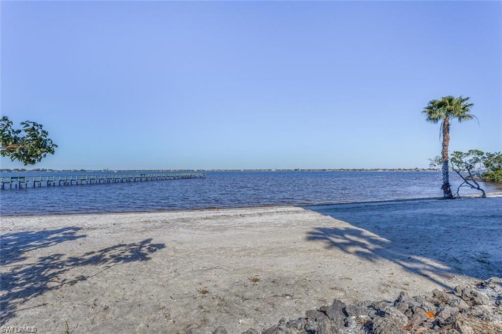 7077 Quail Run Court East, Unit A 15 Fort Myers, FL 33908 - Photo 43 of 43 a view of a room with a yard