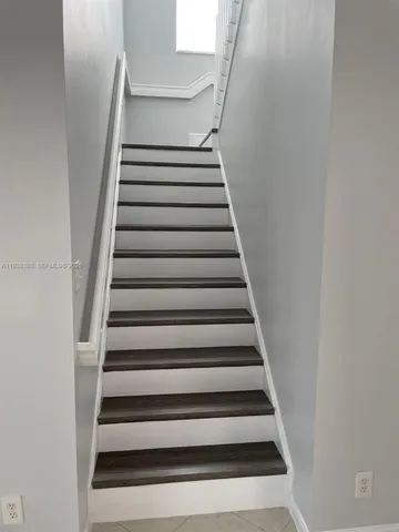 a view of a room with a sink and a window