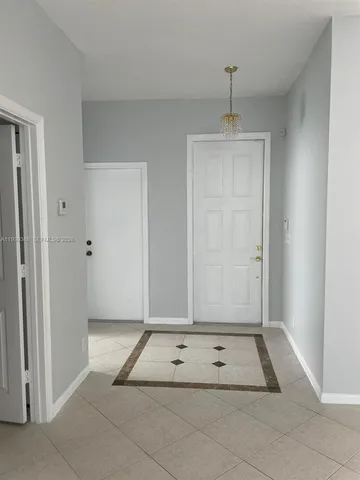 a bathroom with a shower and a toilet