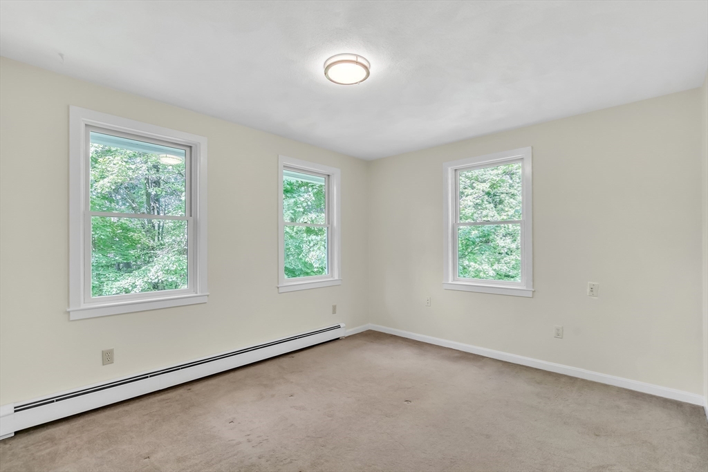 71 Grassland Street Lexington, MA 02421 - Photo 28 of 38 an empty room with windows