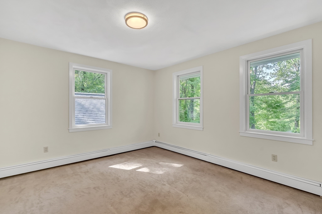 71 Grassland Street Lexington, MA 02421 - Photo 29 of 38 an empty room with a window