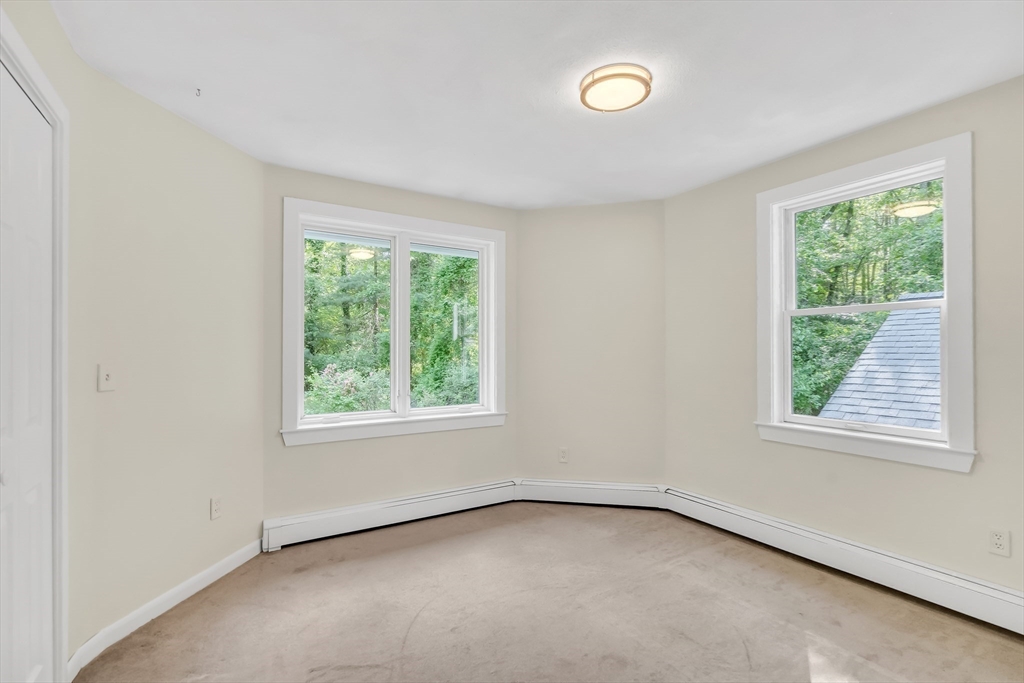 71 Grassland Street Lexington, MA 02421 - Photo 30 of 38 an empty room with a window