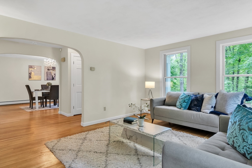 71 Grassland Street Lexington, MA 02421 - Photo 8 of 38 a living room with furniture and a large window