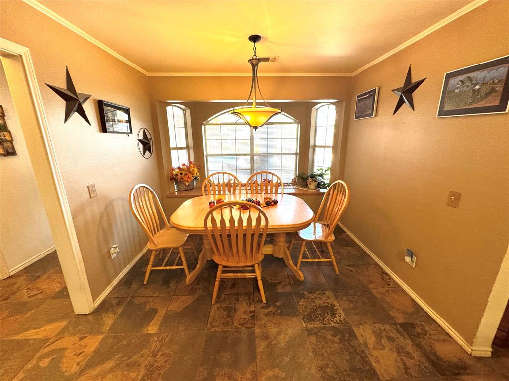 505 3rd Street Dodd City, TX 75438 - Photo 29 of 37 a dining room with furniture and window