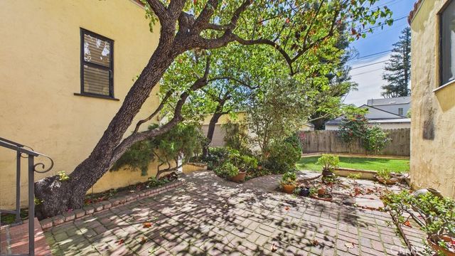 a view of a back yard of the house