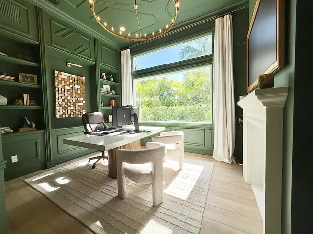 a living room with furniture a window and a table