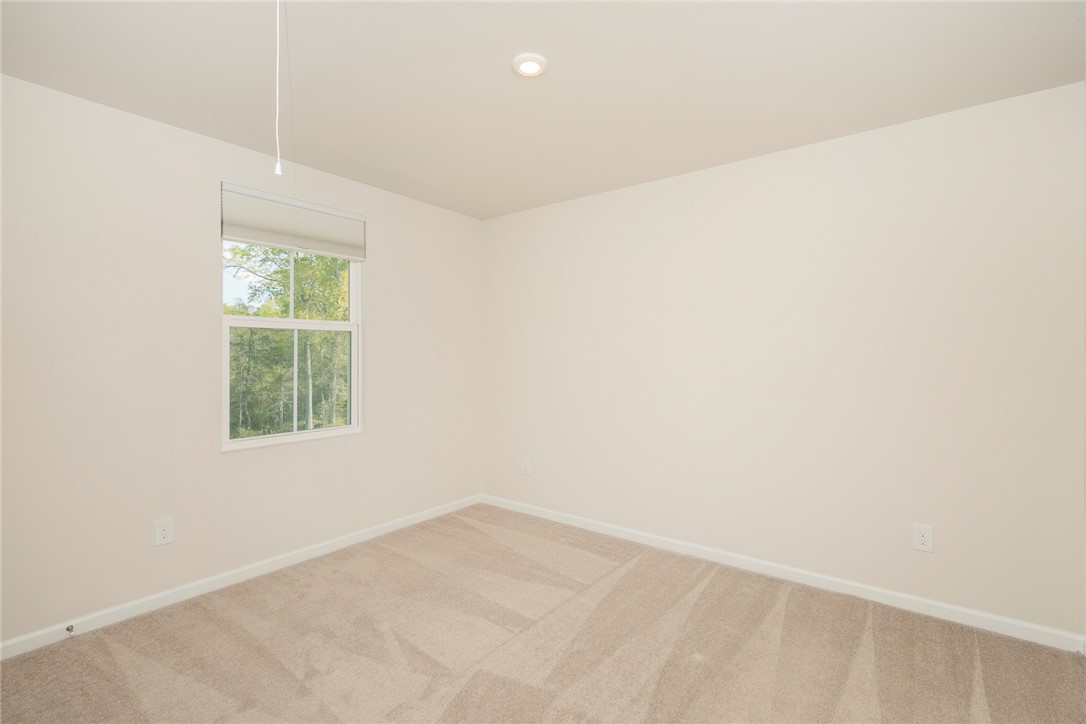 132 Bleckley Trail Anderson, SC 29625 - Photo 12 of 44 This spacious room features carpeted flooring and ample natural light through a single window.