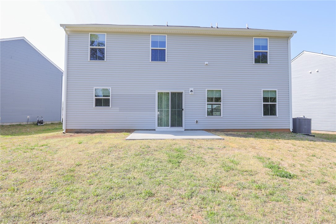 132 Bleckley Trail Anderson, SC 29625 - Photo 17 of 44 This home features a simple backyard with a concrete patio perfect for outdoor enjoyment.