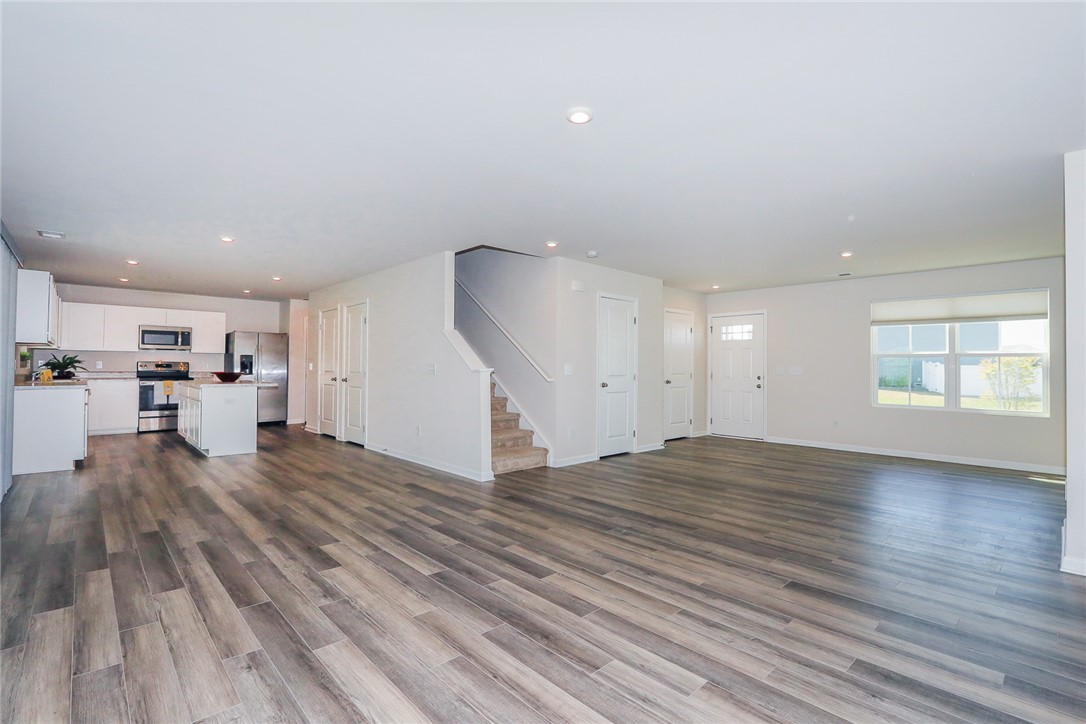 132 Bleckley Trail Anderson, SC 29625 - Photo 19 of 44 This expansive open-concept living space features a modern kitchen and inviting flow throughout.