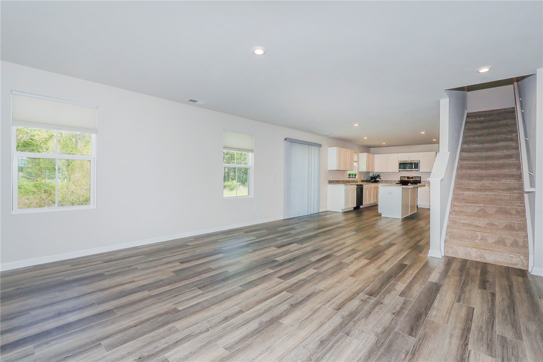 132 Bleckley Trail Anderson, SC 29625 - Photo 2 of 44 This expansive open concept living area seamlessly integrates living, dining, and kitchen spaces.