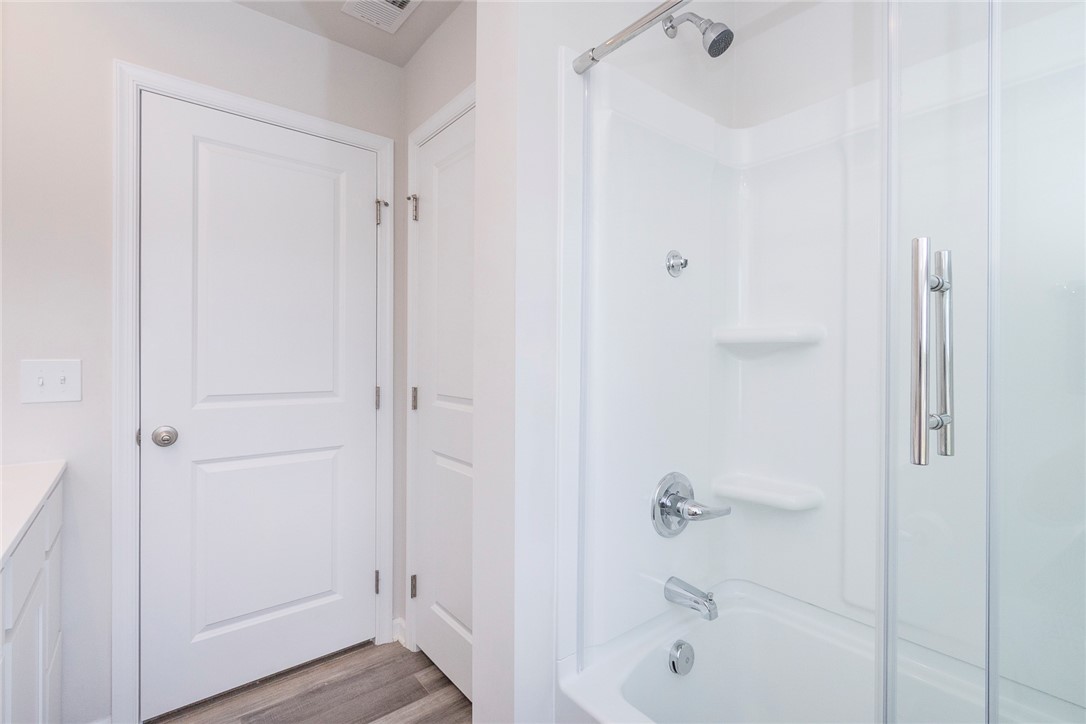 132 Bleckley Trail Anderson, SC 29625 - Photo 28 of 44 This bathroom features a sleek, modern tub and shower combination with stylish fixtures.