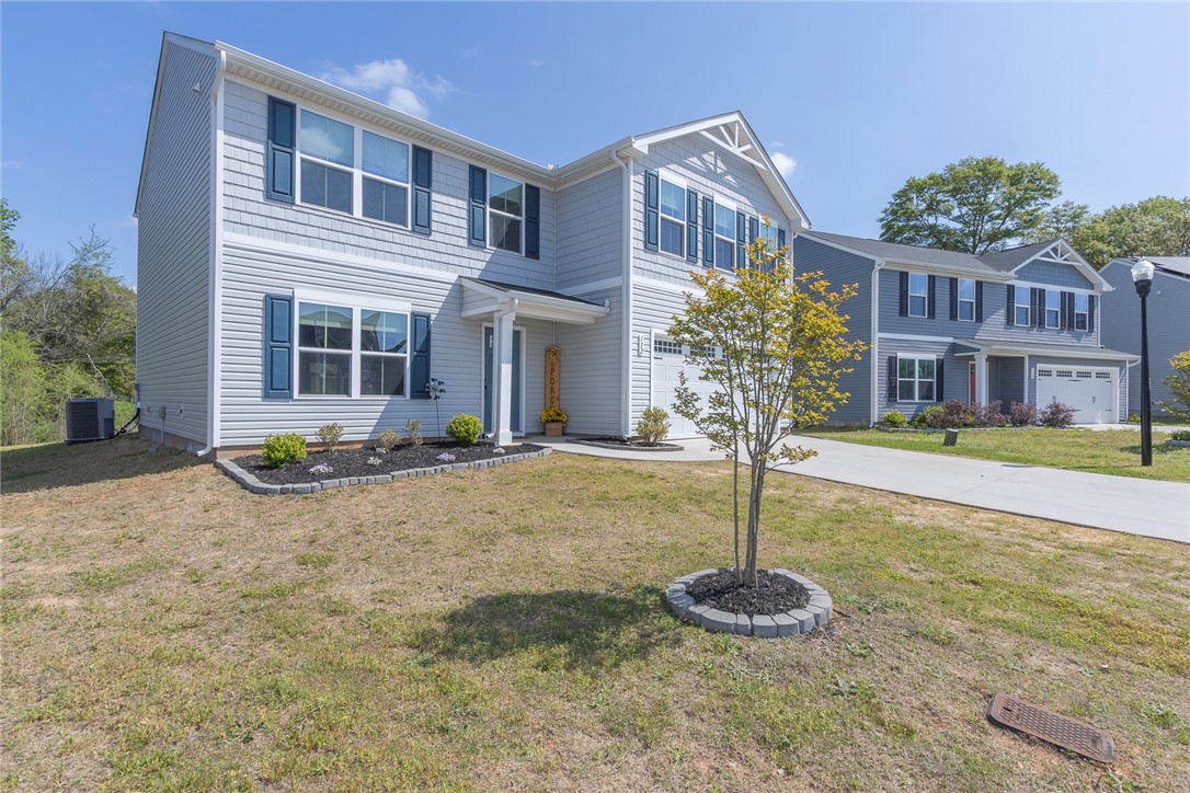 132 Bleckley Trail Anderson, SC 29625 - Photo 35 of 44 A charming two-story residence with classic siding and well-maintained landscaping awaits.