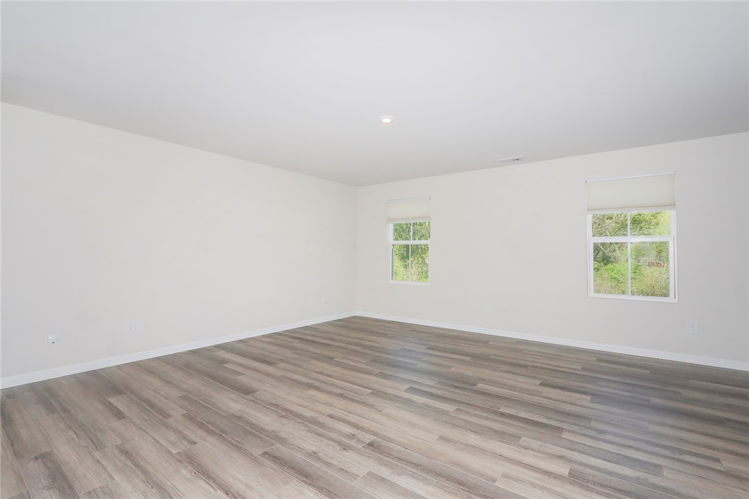132 Bleckley Trail Anderson, SC 29625 - Photo 39 of 44 Bright and airy room with sleek flooring, offering a blank canvas for personalization.