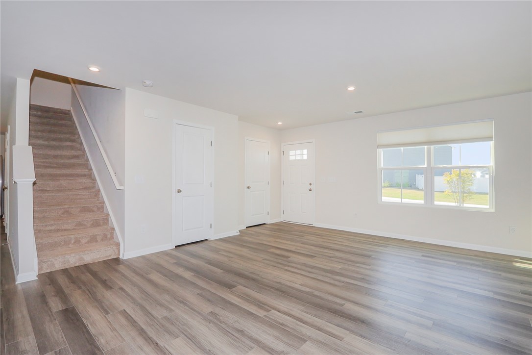 132 Bleckley Trail Anderson, SC 29625 - Photo 43 of 44 This airy interior offers a versatile open layout with ample natural light, ideal for modern living.
