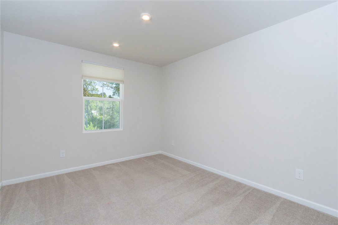 132 Bleckley Trail Anderson, SC 29625 - Photo 6 of 44 This bright and airy room offers a tranquil view of nature, perfect for quiet contemplation.