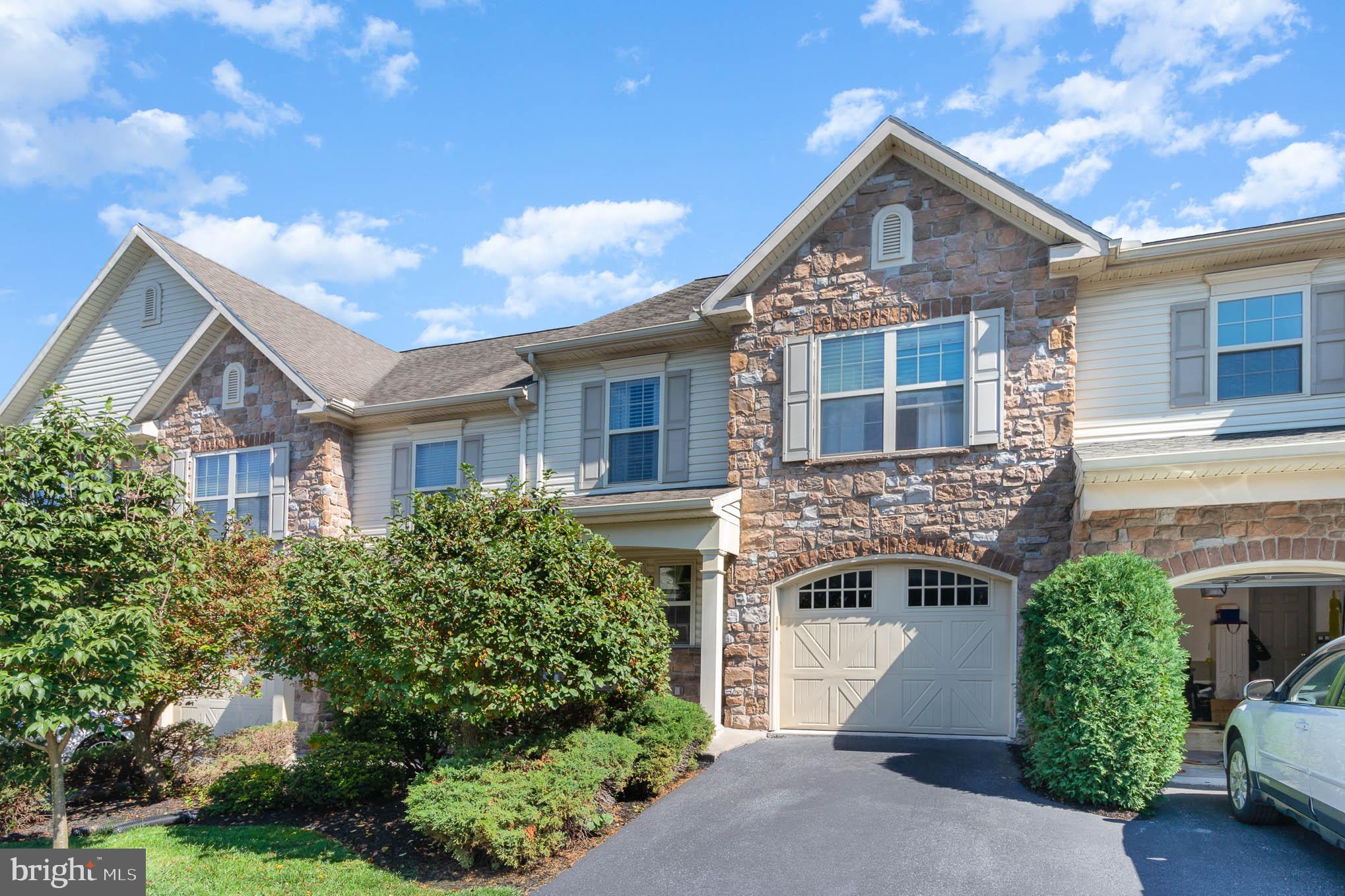 471 Nursery Drive North Mechanicsburg, PA 17055 - Photo 1 of 25 a front view of a house with a yard