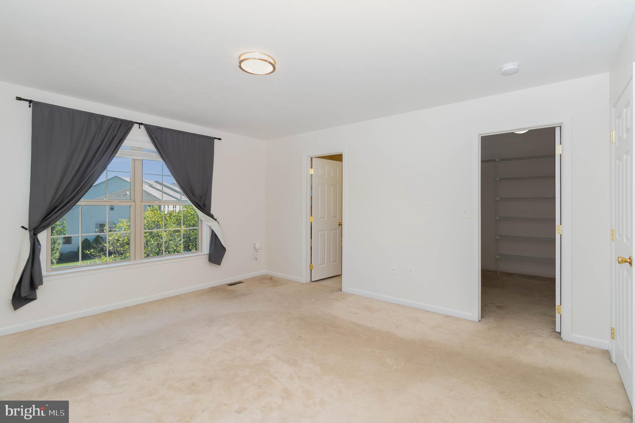 471 Nursery Drive North Mechanicsburg, PA 17055 - Photo 14 of 25 an empty room with windows and entrance
