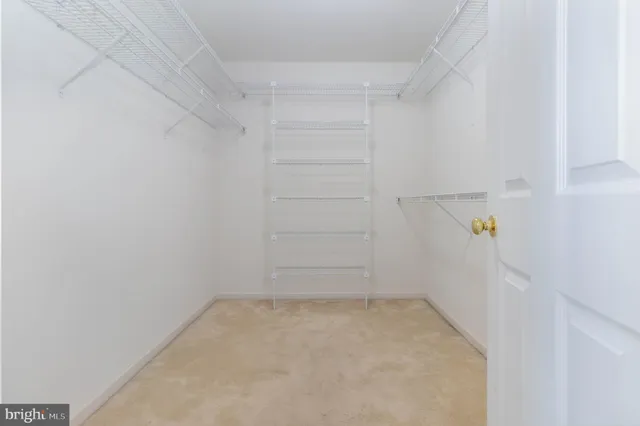 a bathroom with a double vanity sink toilet and shower
