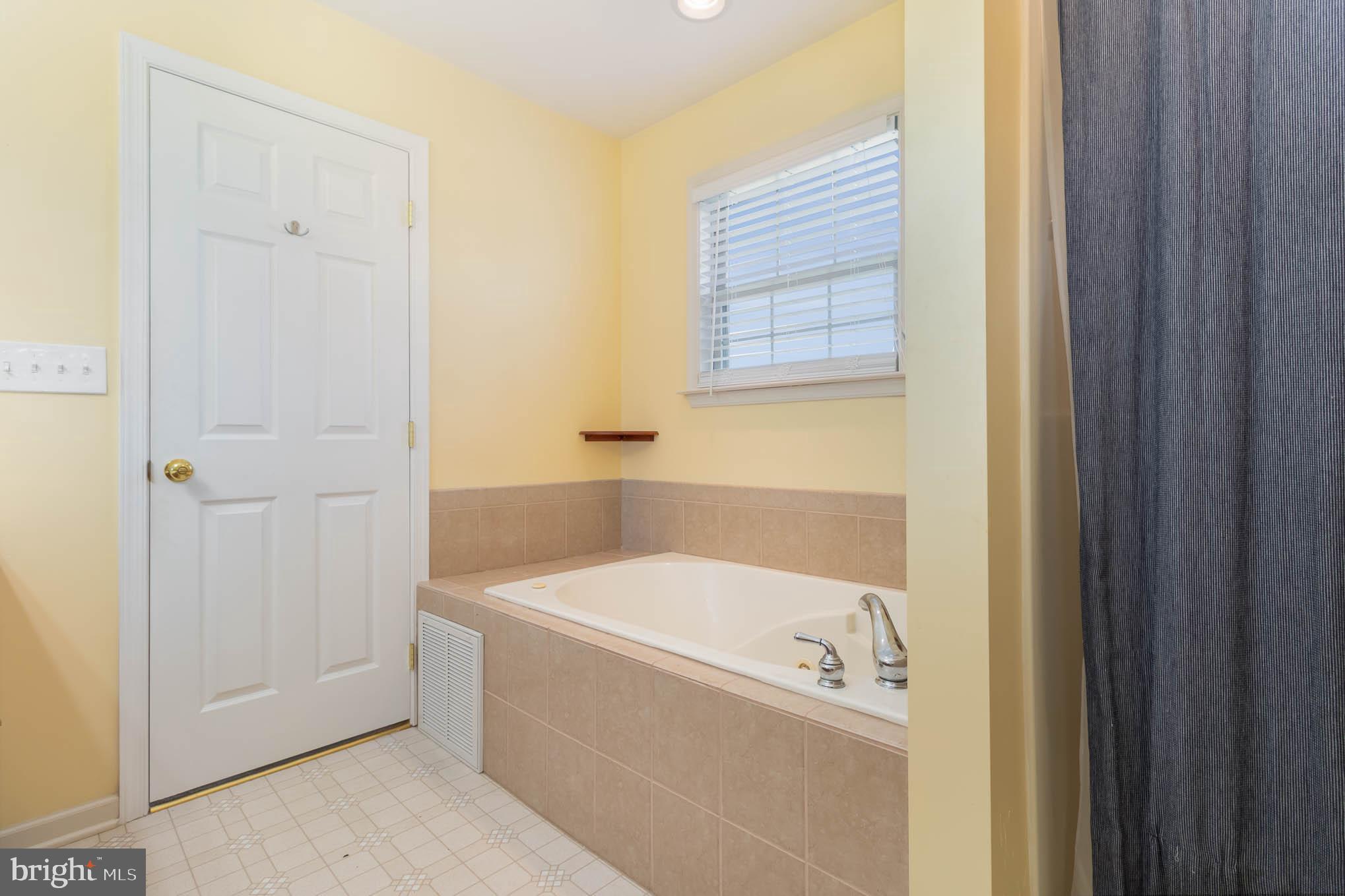 471 Nursery Drive North Mechanicsburg, PA 17055 - Photo 18 of 25 a bathroom with a bathtub and a shower
