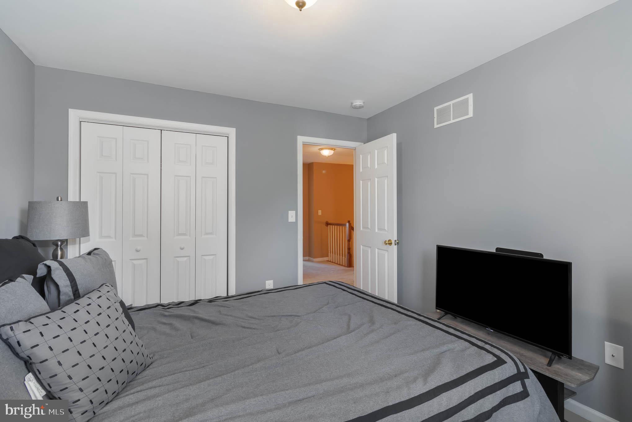 471 Nursery Drive North Mechanicsburg, PA 17055 - Photo 20 of 25 a bedroom with a bed and a chair