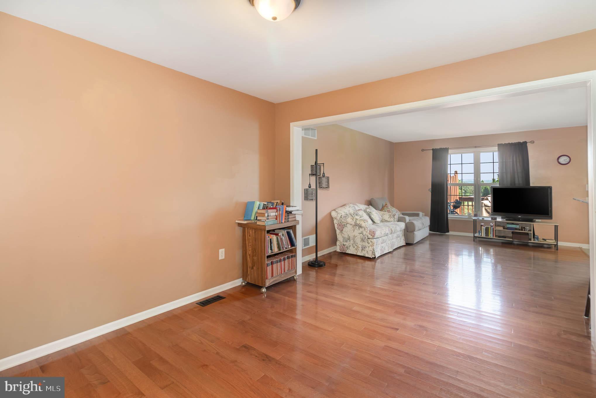 471 Nursery Drive North Mechanicsburg, PA 17055 - Photo 5 of 25 a living room with furniture and a flat screen tv
