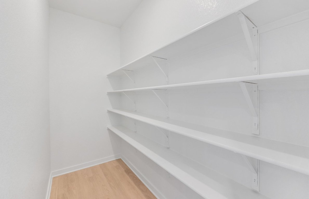 400 Sullivan Way Elgin, TX 78621 - Photo 11 of 30 a view of an empty walk in closet