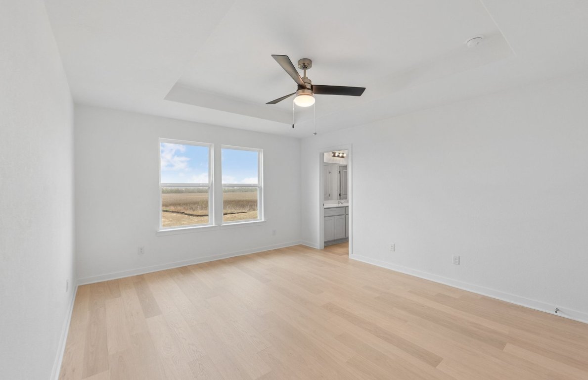 400 Sullivan Way Elgin, TX 78621 - Photo 12 of 30 a view of an empty room with a window