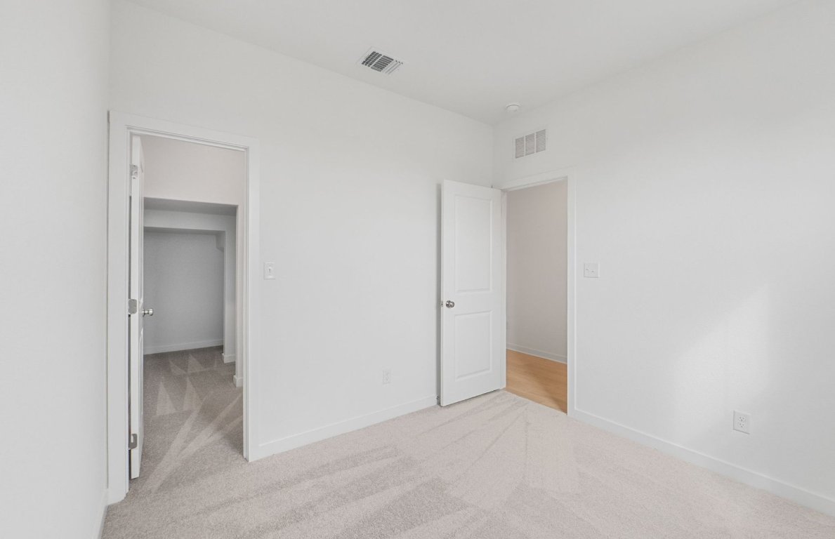 400 Sullivan Way Elgin, TX 78621 - Photo 23 of 30 a view of an empty room and a bathroom