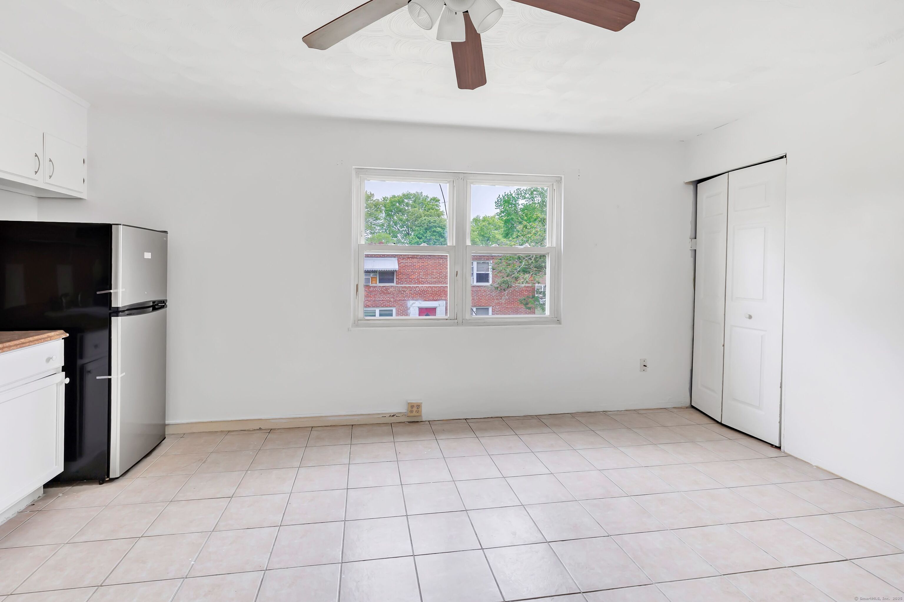 367 D Building 5 Granfield Avenue Bridgeport, CT 06610 - Photo 4 of 13 a view of an empty room with a window