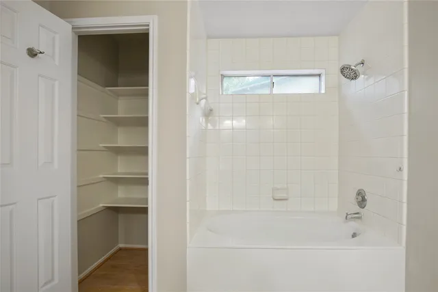 a bathroom with a bathtub