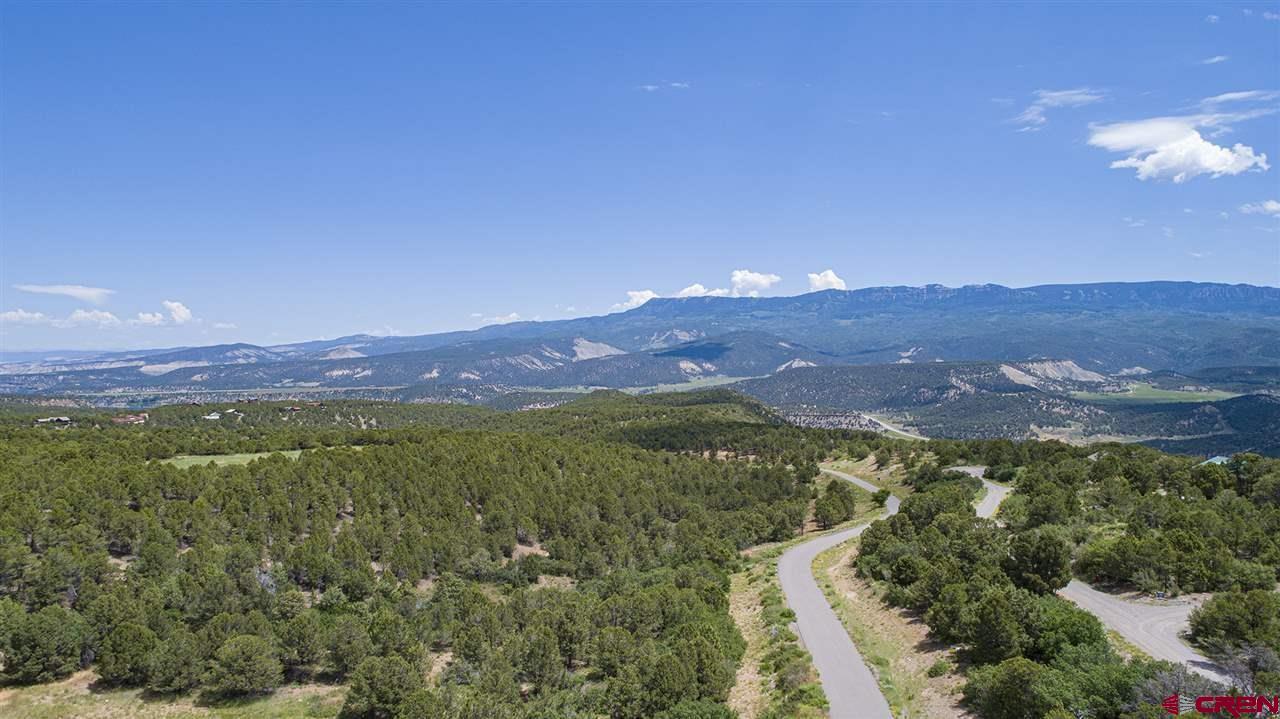 Tbd Lot 3 Tbd Way Ridgway, CO 81432 - Photo 5 of 12 a view of a town with mountains in the background